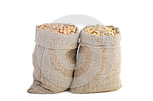 Jute sack with dried peas and soja beans photo