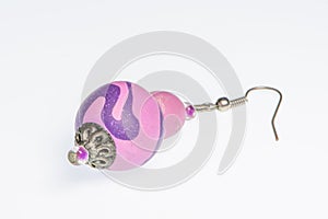 Juvenile cut pink and purple earring