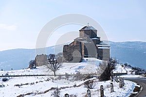 Jvari Monastery is one of the most famous place in Georgia. Top view of with Mtskheta town and the confluence of the Mtkvari and