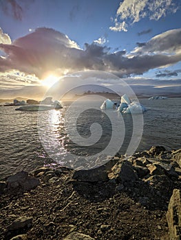 JÃ¶kulsÃ¡rlÃ³n lagoon in Iceland with icebergs floating in it