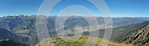Drone aerial view to the Seriana valley and Orobie Alps in a clear and blue day photo