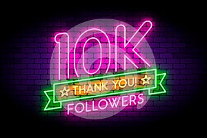 10K, 10000 followers neon sign on the wall. photo