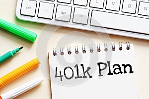 401K PLAN words in an office notebook