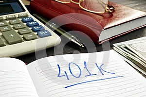 401k Retirement plan in the notebook and calculator