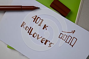 401k Rollovers text on sticky notes isolated on office desk photo