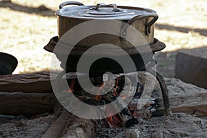 Ka Chuan village, cooking pot over wood fire