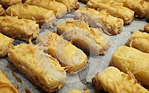 Kaasstengels with cheese topping