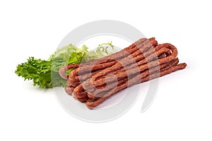 Kabanos. Polish long thin dry sausage made of pork. Isolated on white background