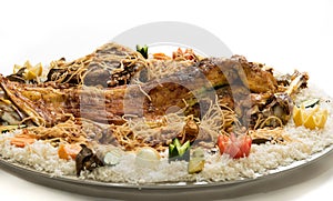 Kabsa with cooked meats - Mandi - Kabsah - Mandi Kabsah Rice with Meats and Vegetables photo