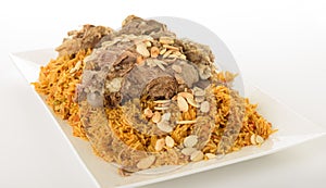 Kabsa with cooked meats in white background - Mandi Rice Kabsah with Meats - Mandi Meats photo