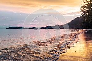 Golden hour at Yenanas beach, Kabui Bay, Gam island, Raja Ampat - West Papua, Indonesia photo