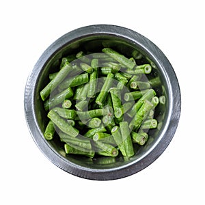 Kacang panjang or yardlong bean, chunks of string beans in a metal container, isolated on a white background