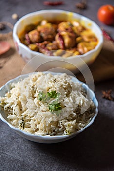 Kadhi chawal an Indian delicacy prepared with rice by putting fried fritters