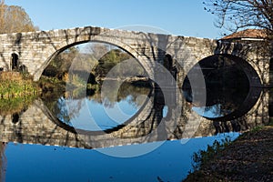 Kadin most - a 15th-century stone arch bridge over the Struma River at Nevestino, Bulgaria