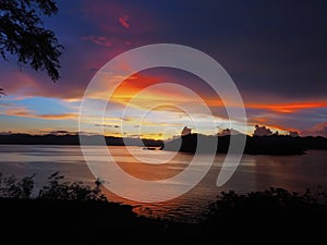 Kaengkrachan National park,Petchburi, Thailand under Nimbus cloud and sunset with Chaipattana low speed surface aerator to pump o