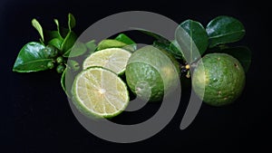 Kaffir Lime or Citrus hystrix. Some are whole, some have been sliced