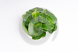 Kaffir lime leaf Daun limau purut isolated on white background