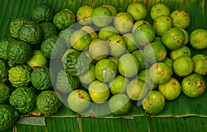 Kaffir Lime and Lime sold in Market on top of Banana Leaves