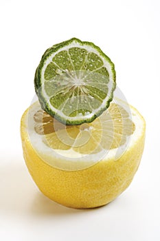 Kaffir limes, and lemons, close-up