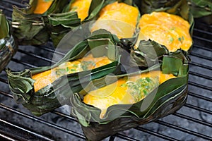 Kai Pam, Egg mixed with vegetable and grill on banana leaf.