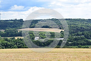 Kaisersesch, Germany - 07 26 2022: The Autobahn exit with a few cars approaching