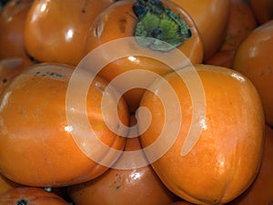 Kakis. Large persimmon.Background from Fruit persimmon.