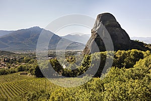 Kalabaka town from miraculous monastery on rock formation, Meteora, Greece, beside the Pindos Mountains