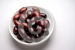 Kalamata black olives in a dish