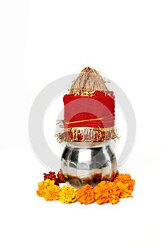 Kalash with coconut and chunni with floral decoration for navratri festival