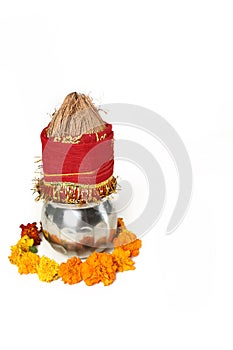 Kalash with coconut and chunni with floral decoration for navratri pooja