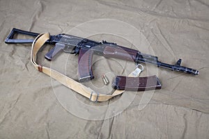 Kalashnikov AK 74 with ammunitions on canvas