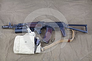 Kalashnikov AK 74 with ammunitions on canvas