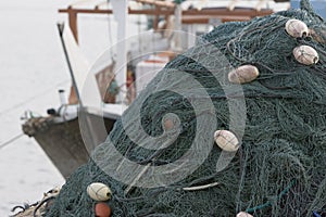 Kalba UAE Fishing nets piled high on boat in Kalbar Fujairah photo