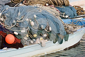 Kalba UAE Fishing nets piled high on boat in Kalbar Fujairah photo