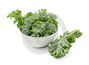 Kale in bowl on white background