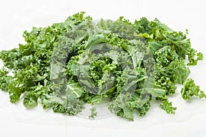 Kale leaves on white background