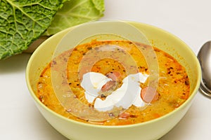 Kale soup with frankfurter photo