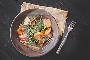 Kale and tomato stir-fry, close up