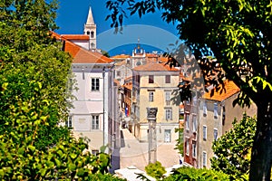 Kalelarga and historic Zadar landmarks view through green frame