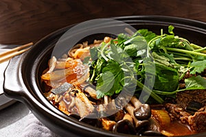 Kalguksu with water parsley and vegetables