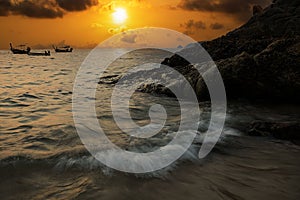 Kalim Beach with boat at twilight time sky in summer Phuket