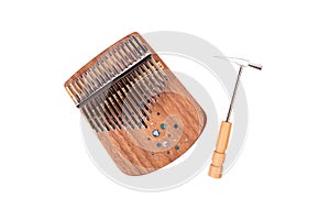 Kalimba or Mbira is an African musical instrument and hammer for tuning isolated on white background. Music concept