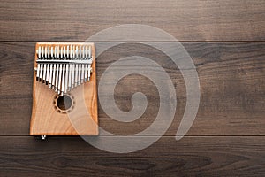 Kalimba on the wooden background