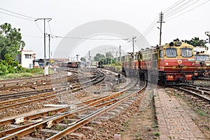 Kalka, Haryana, India May 14 2022 - Indian toy train diesel locomotive engine at Kalka railway station during the day time, Kalka