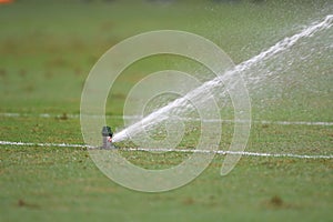 Kallang-Singapore-30Jul2018:Water sprinklers emerge from the underground during icc2018 between Atletico madrid against at paris photo