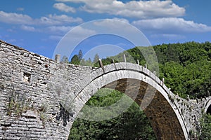 Kalogeriko arched stone bridge Zagoria summer season