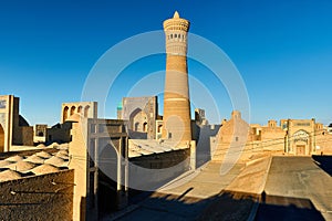 Kalyan Minaret and madrasah in Bukhara, Uzbekistan photo