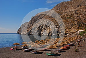 Kamari Town with her Popular Black Pebble Beach