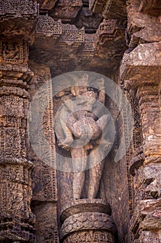 Kamasutra postures in Hindu Indian Temples. Erotic statues. Hindu Sun Temple, Konark, Orissa, India.