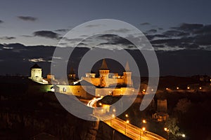 Kamianets-Podilskyi Castle at dusk